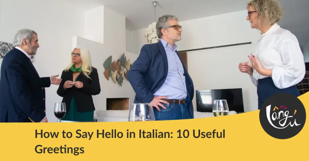 A group of senior adults enjoying a casual indoor social gathering with wine and snacks. Hello in Italian